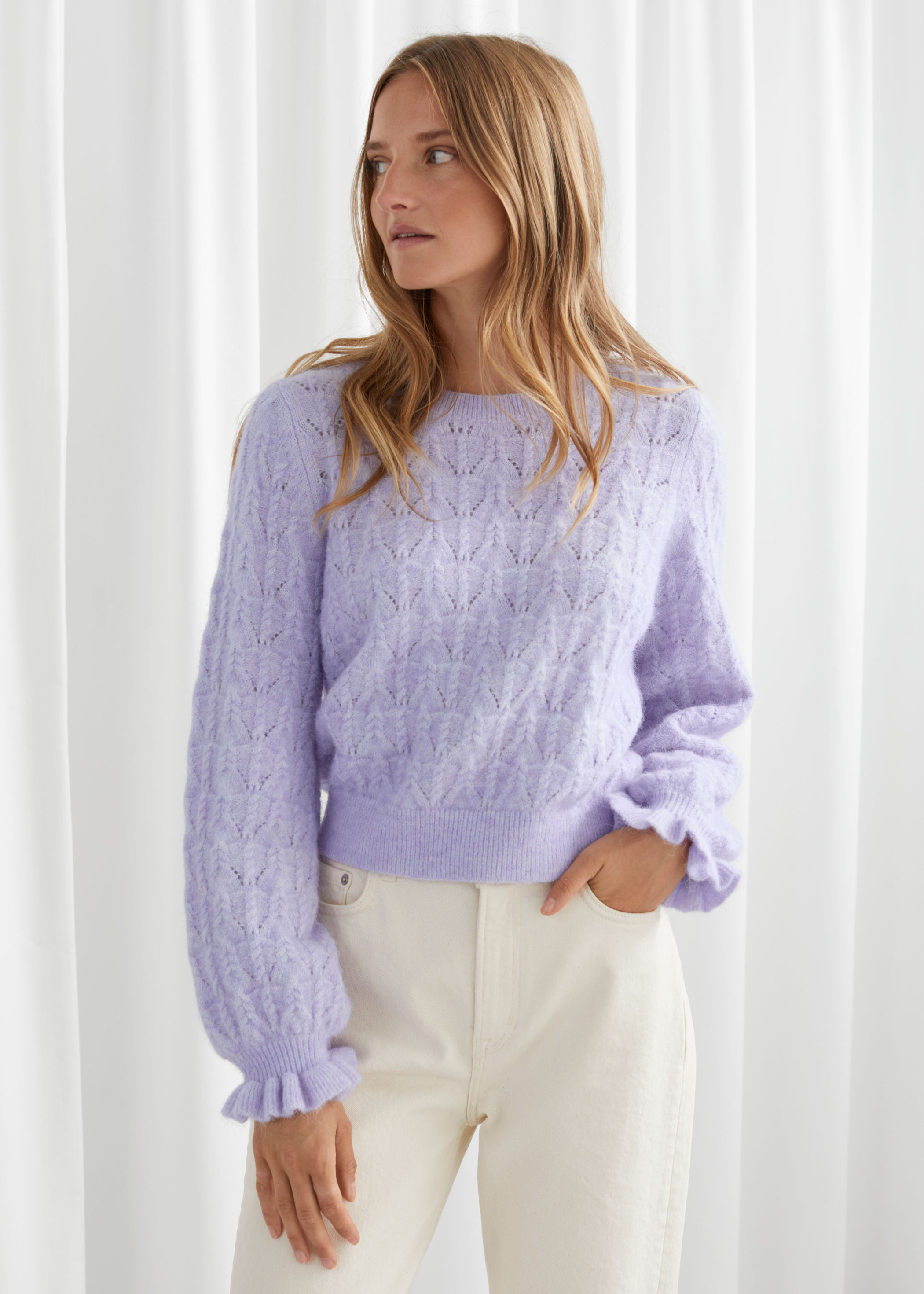 cable knit sweater with ruffles