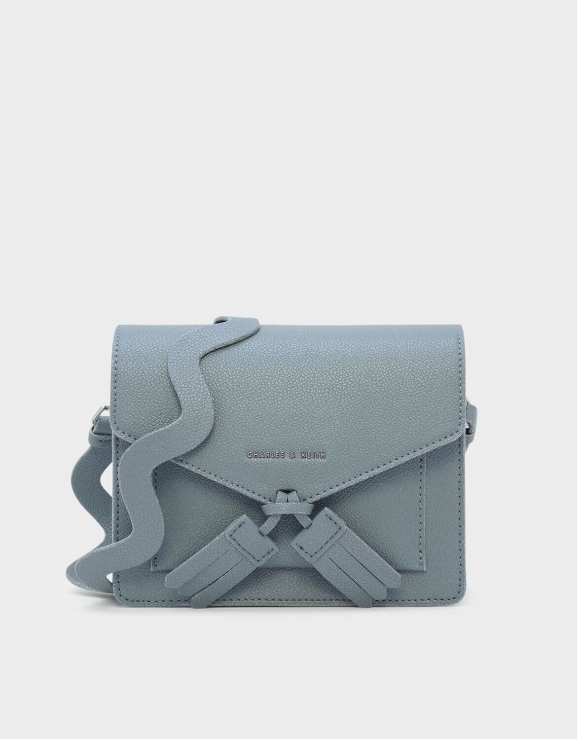 charles and keith tassel bag