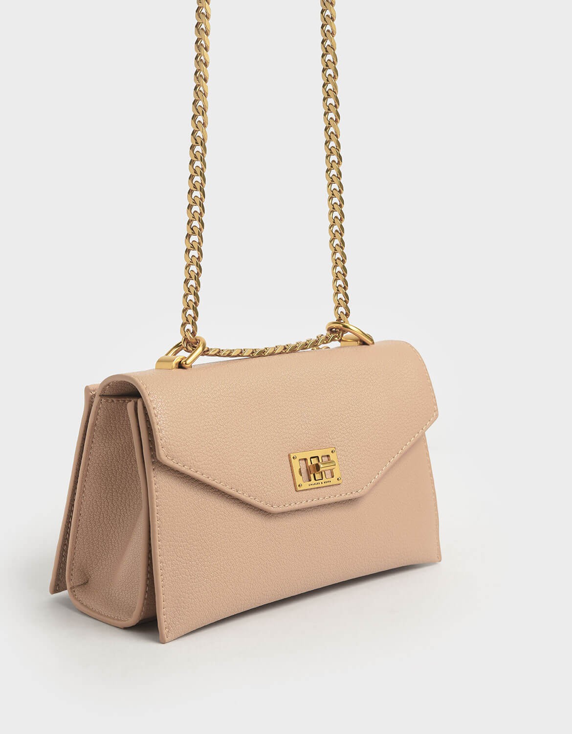 charles and keith turn lock crossbody bag