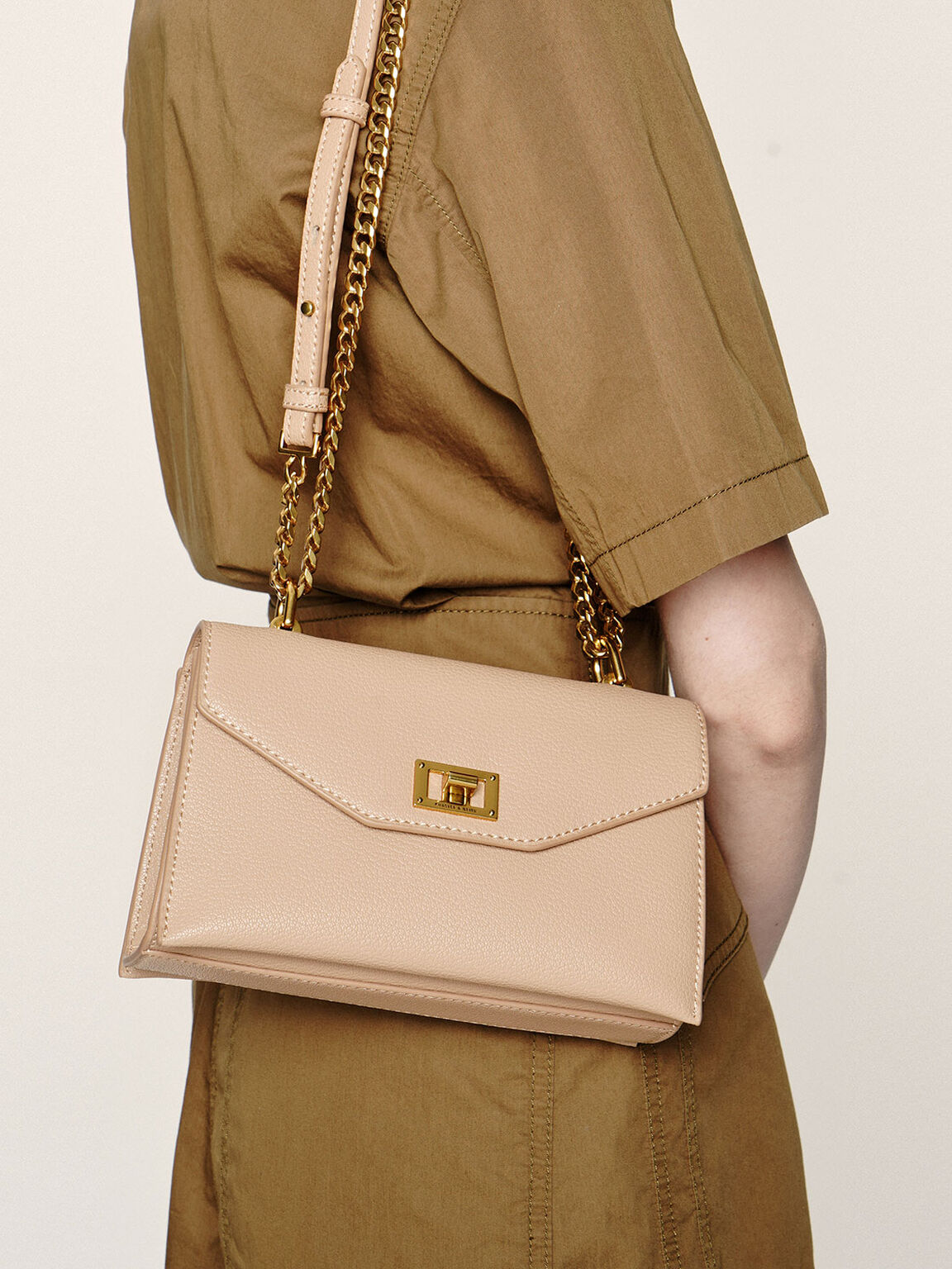 charles and keith turn lock crossbody bag