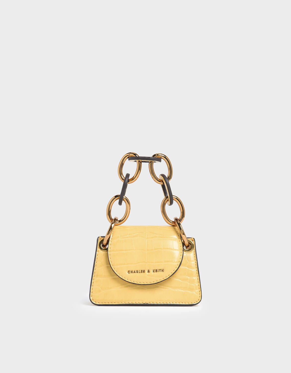 charles and keith yellow wallet