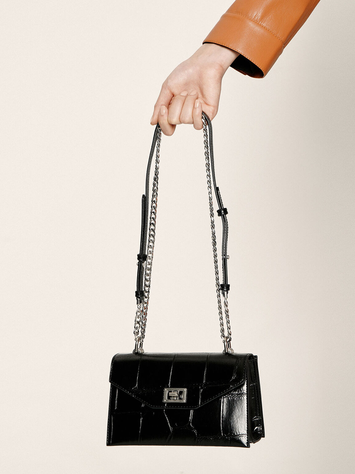 charles and keith turn lock crossbody bag