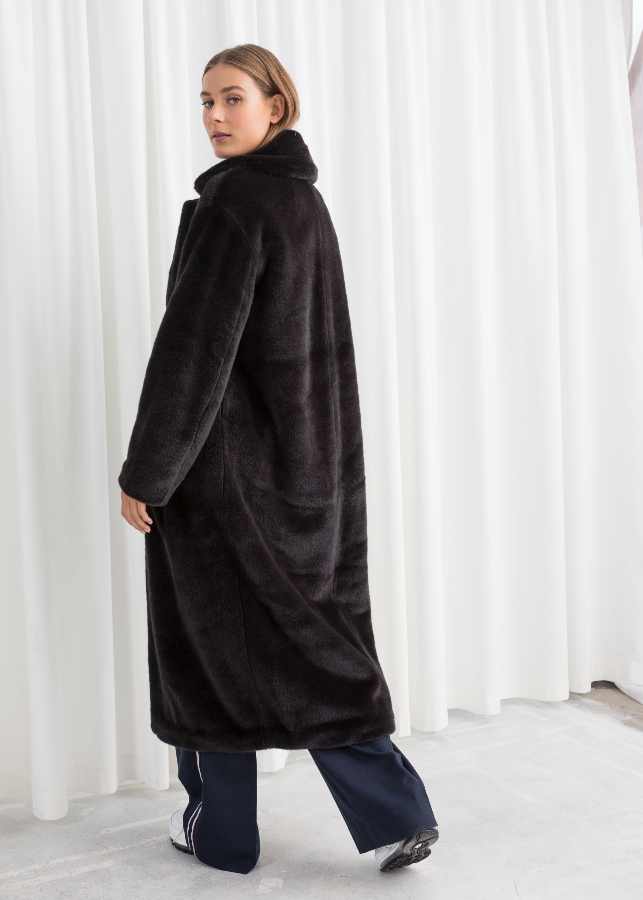 long faux fur coat with hood