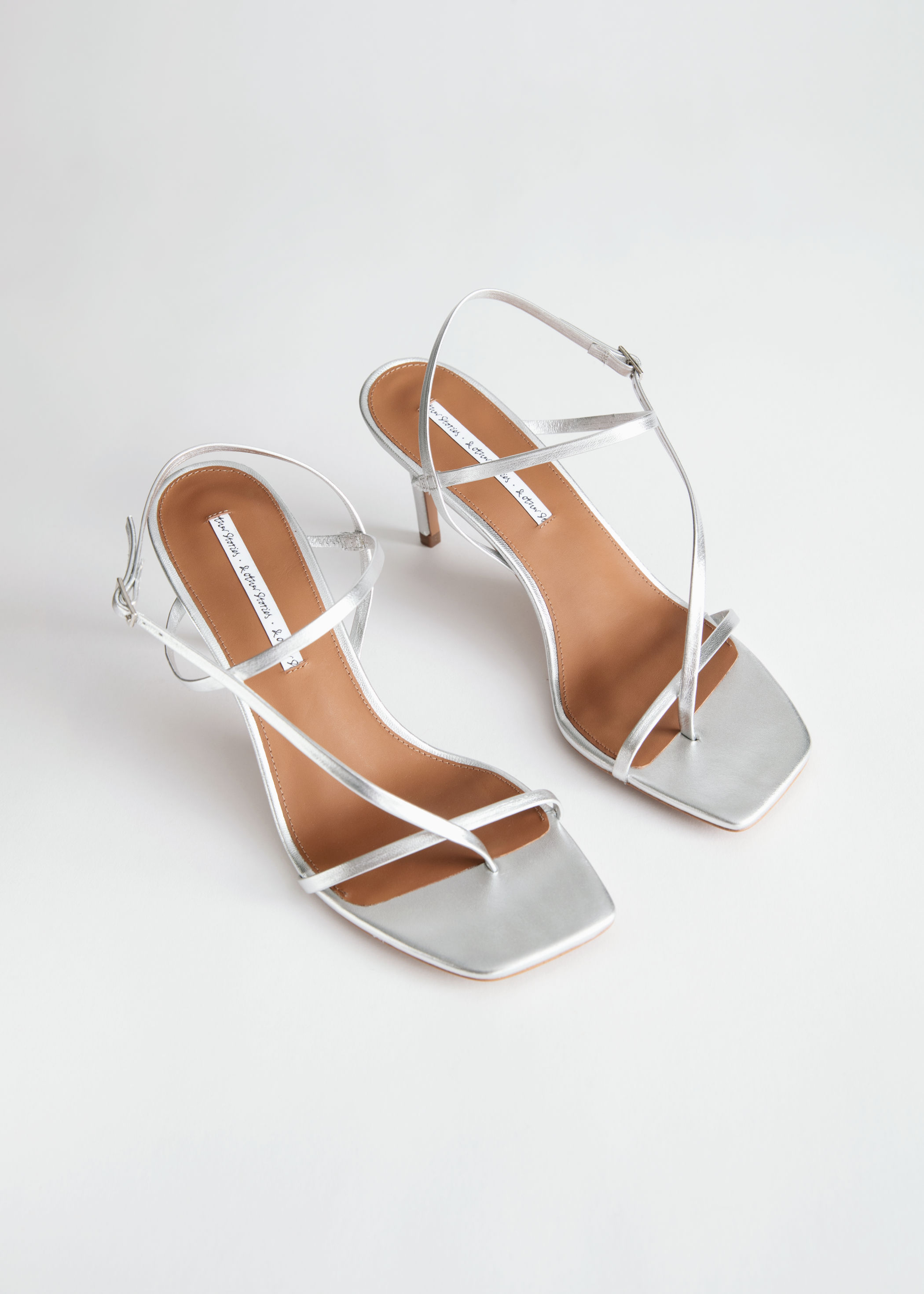 cross strap heeled sandals