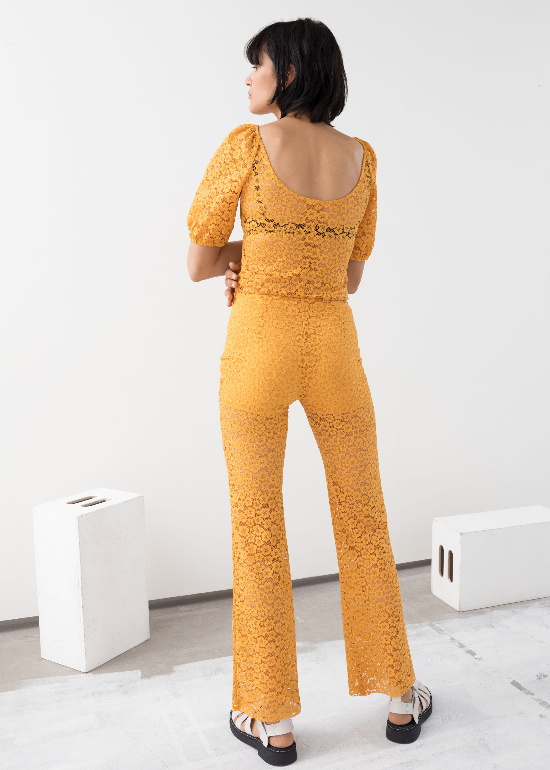 yellow flared trousers