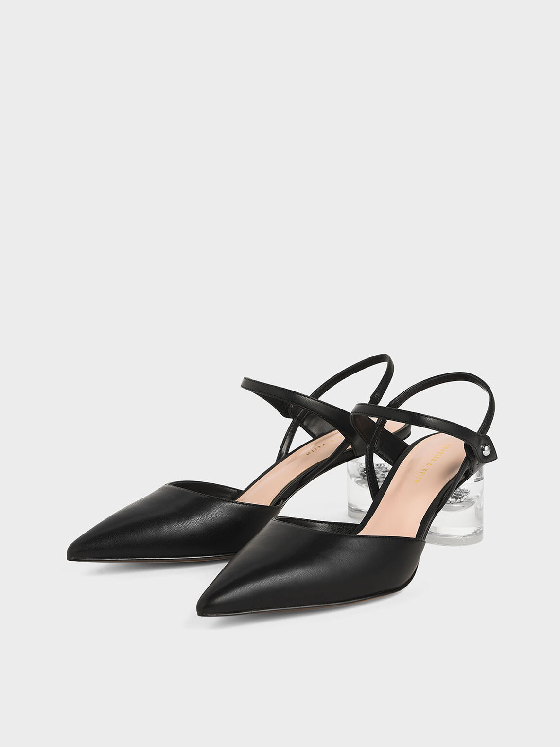lucite heel pumps