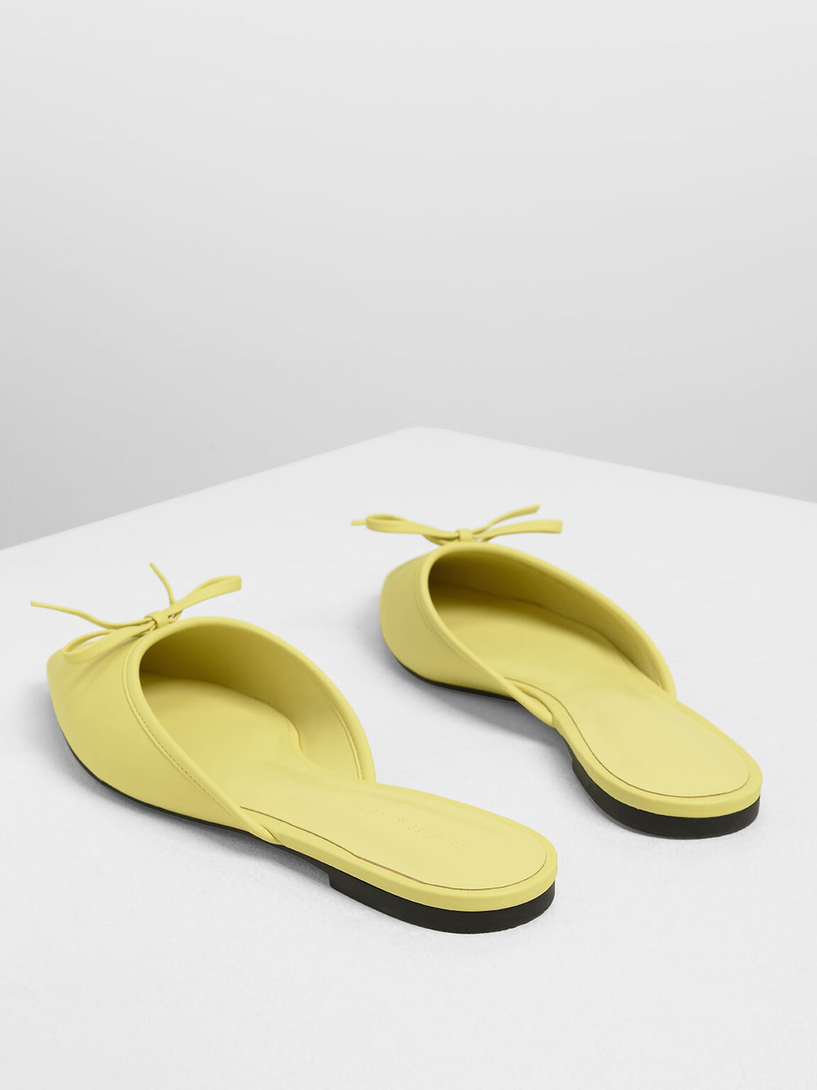 yellow bow mules