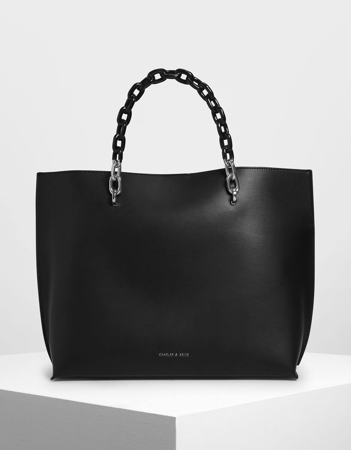 black chain handle tote bag