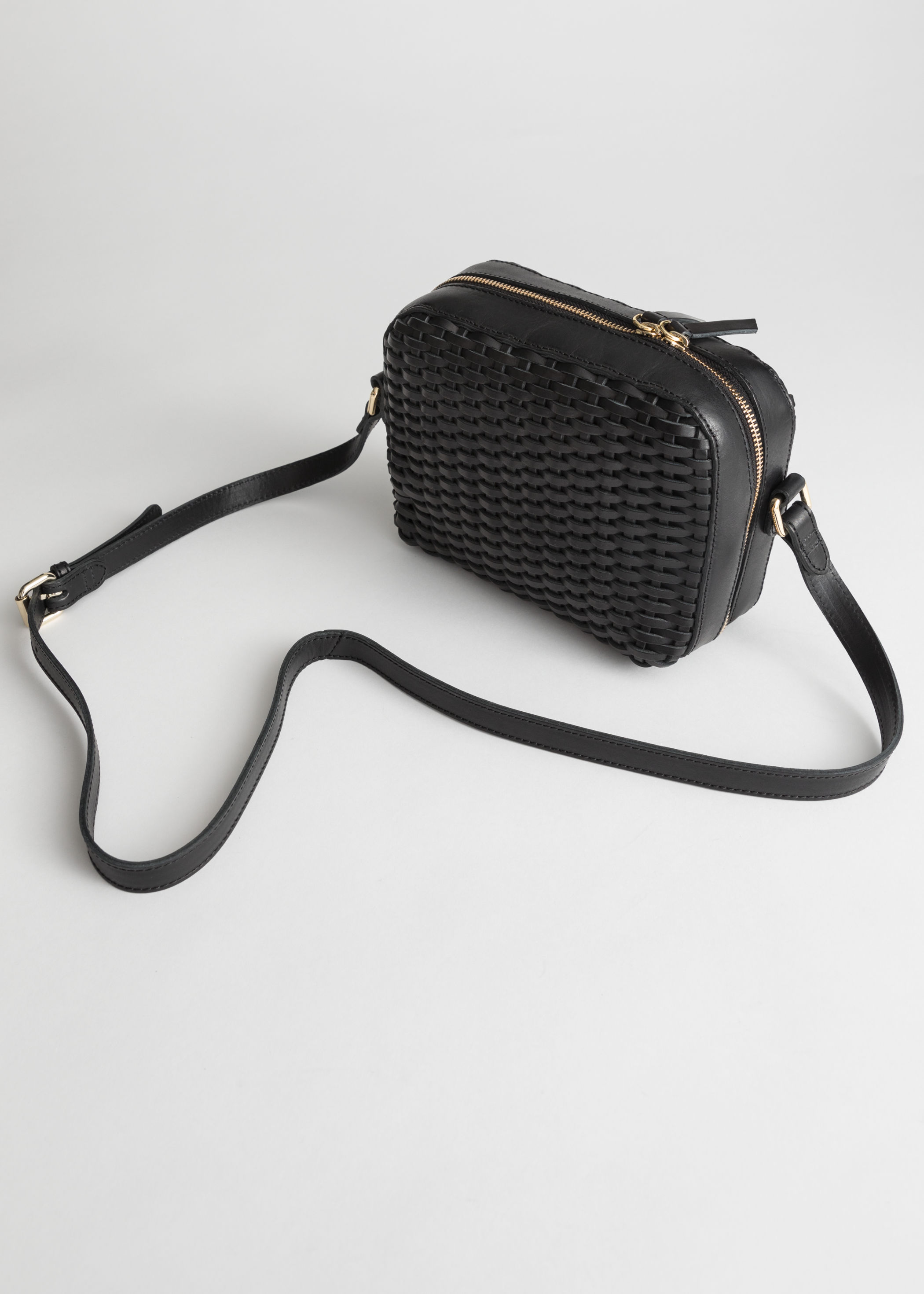 black woven crossbody bag