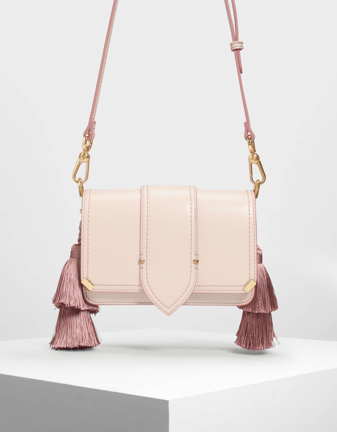 charles and keith tassel bag