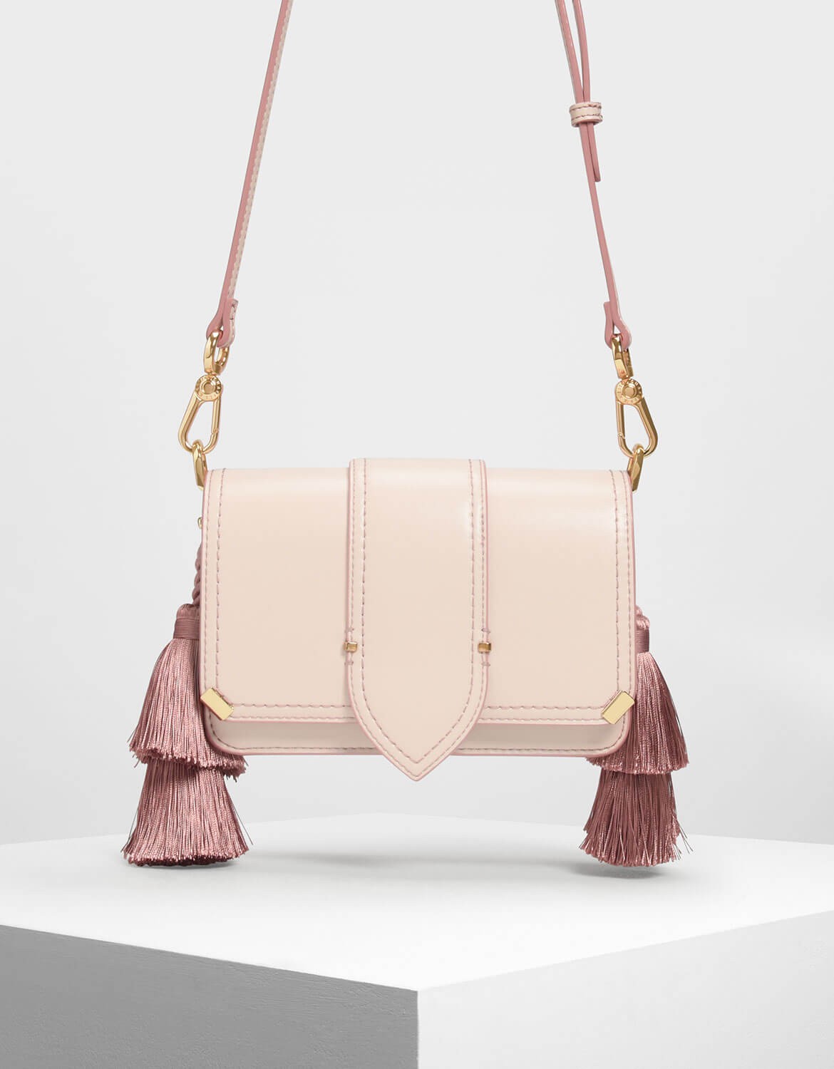 charles and keith tassel shoulder bag