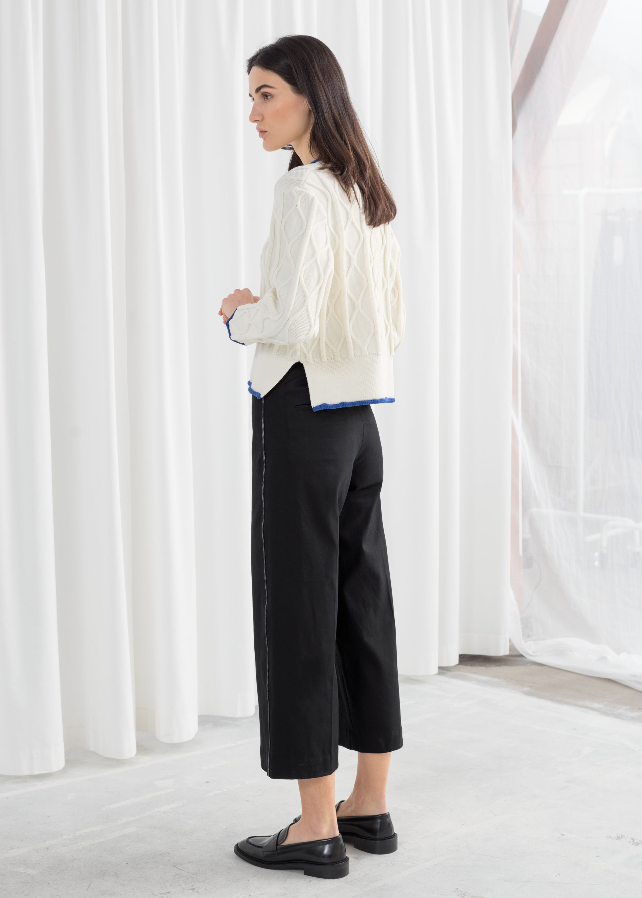 white cropped cable knit sweater