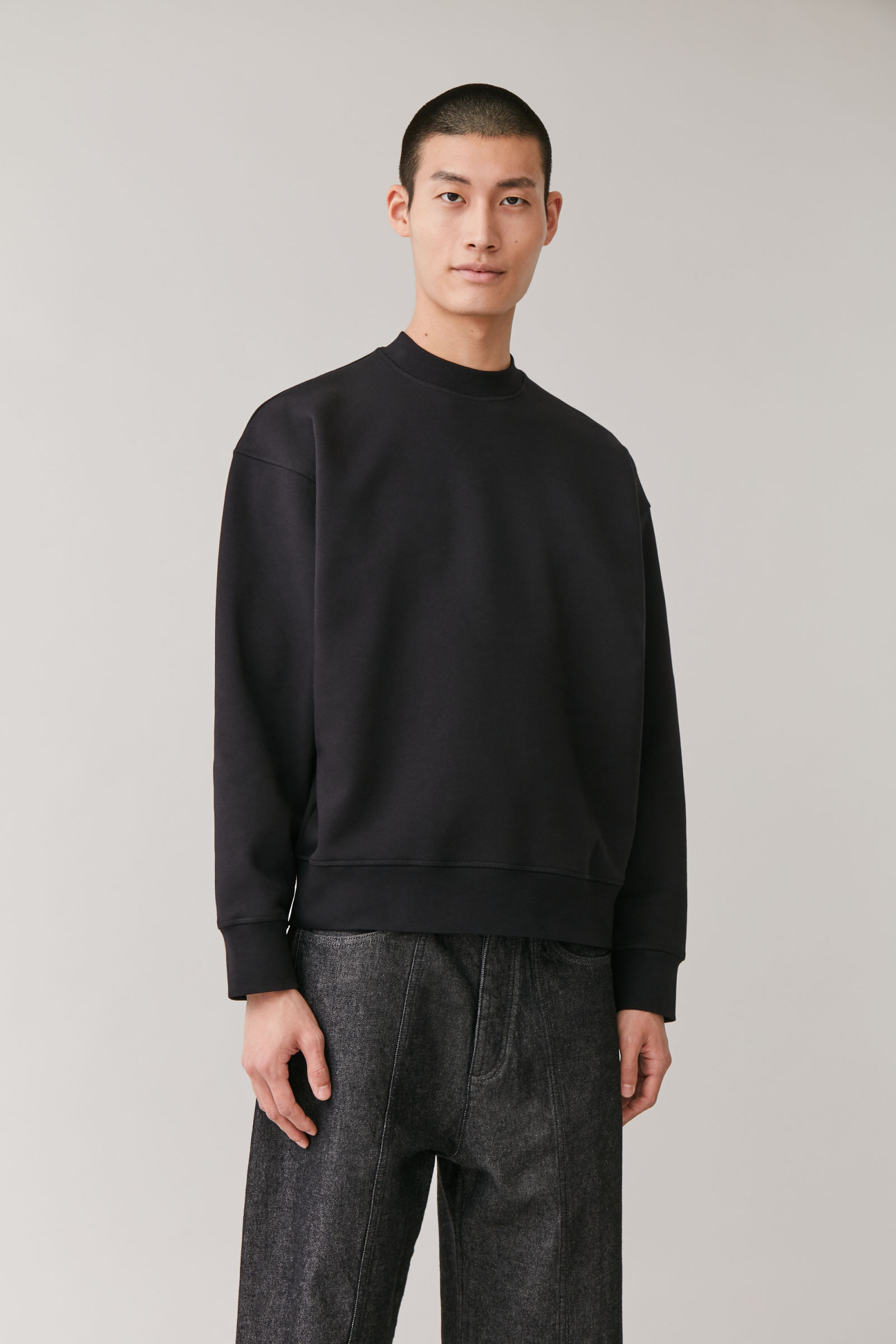 cos black sweatshirt