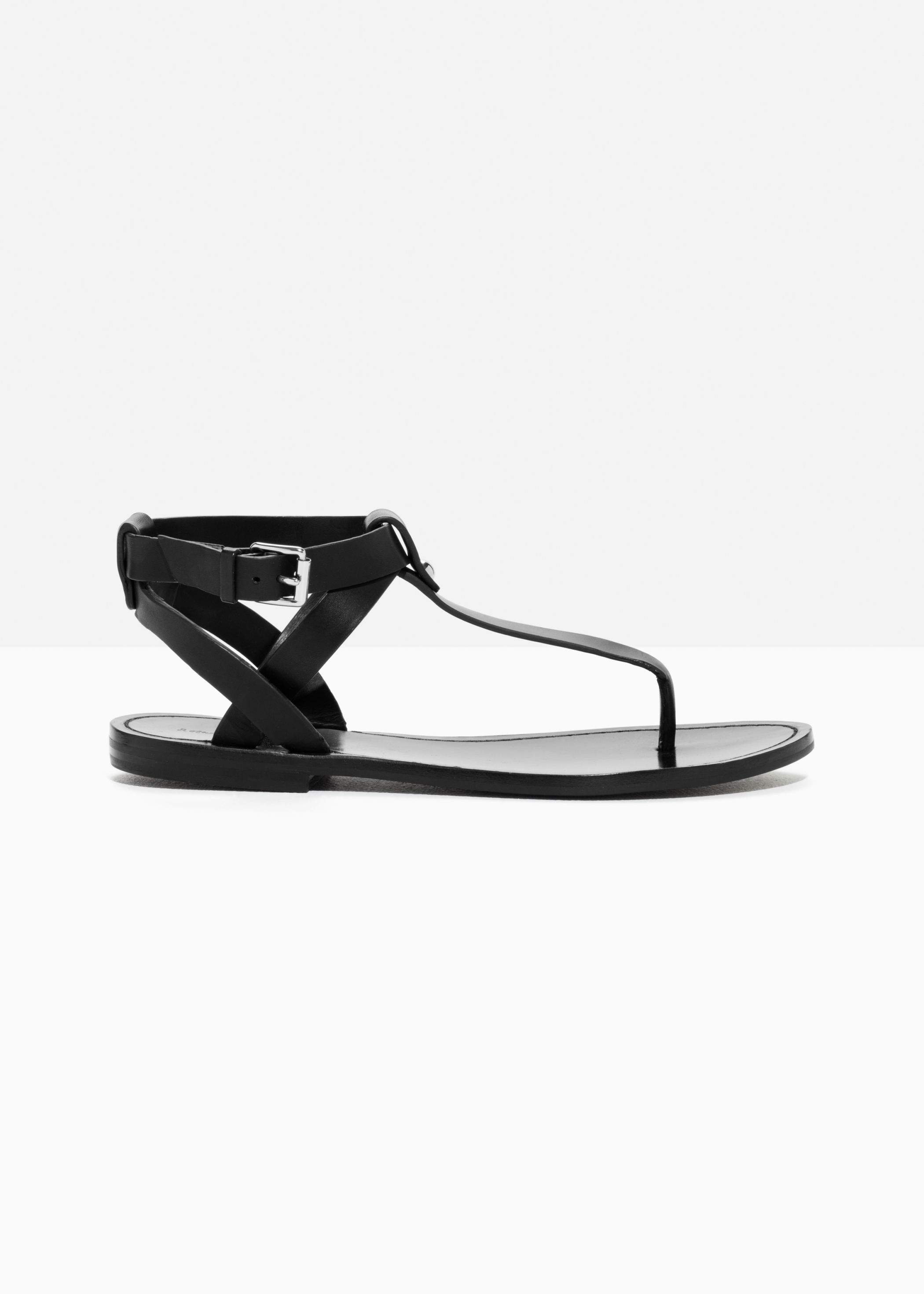 black leather thong sandals