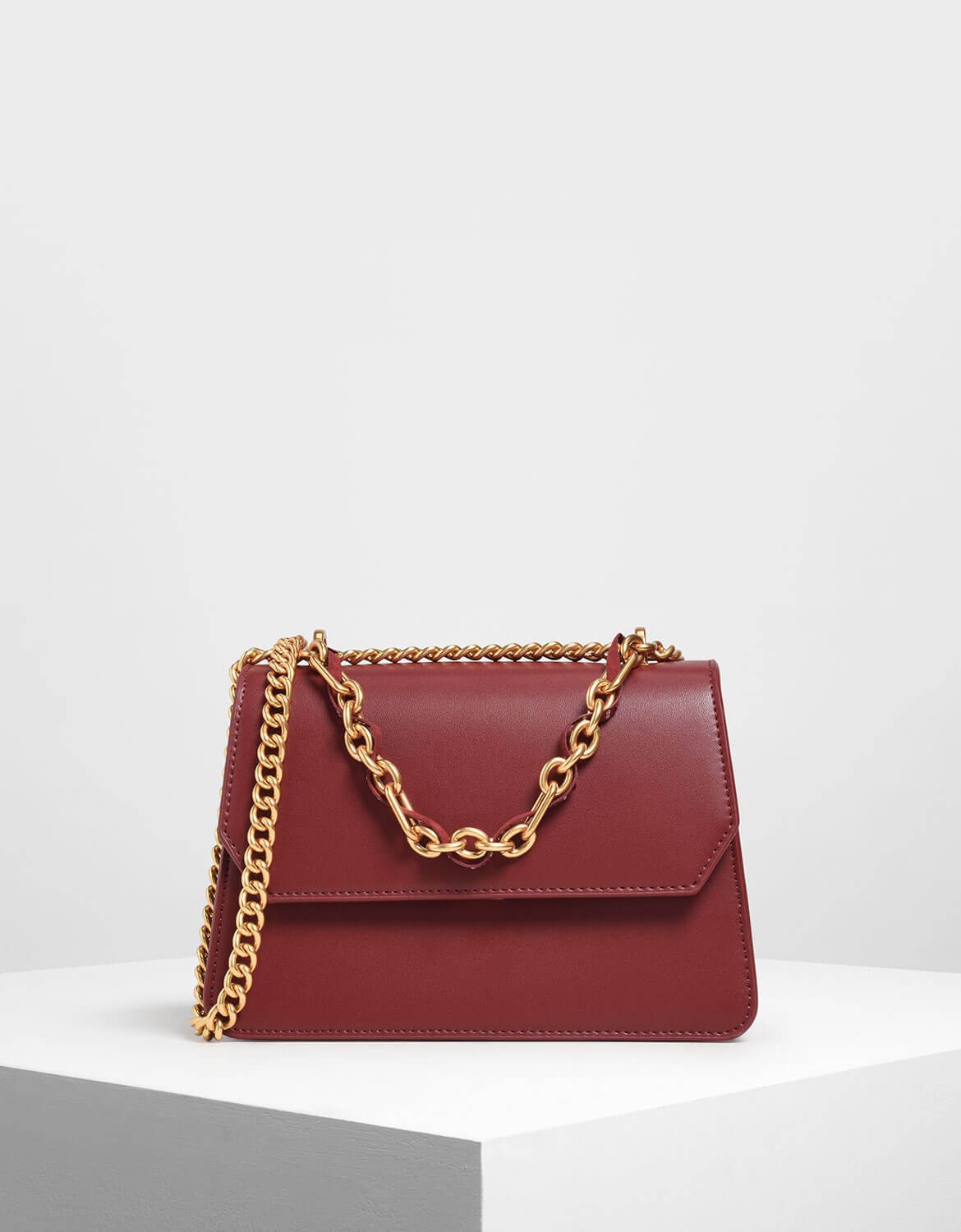 charles and keith burgundy bag