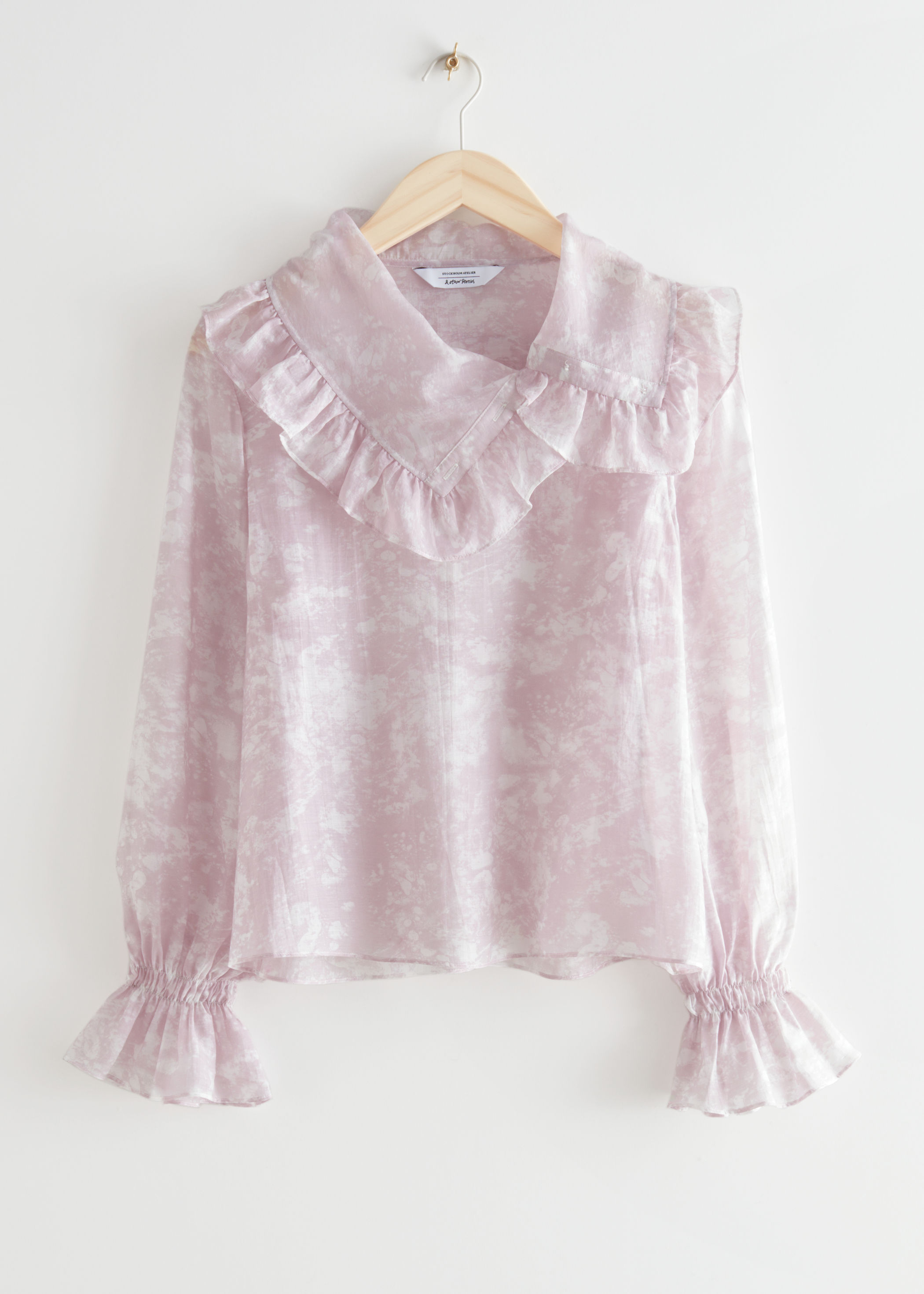 sheer ruffle sleeve top