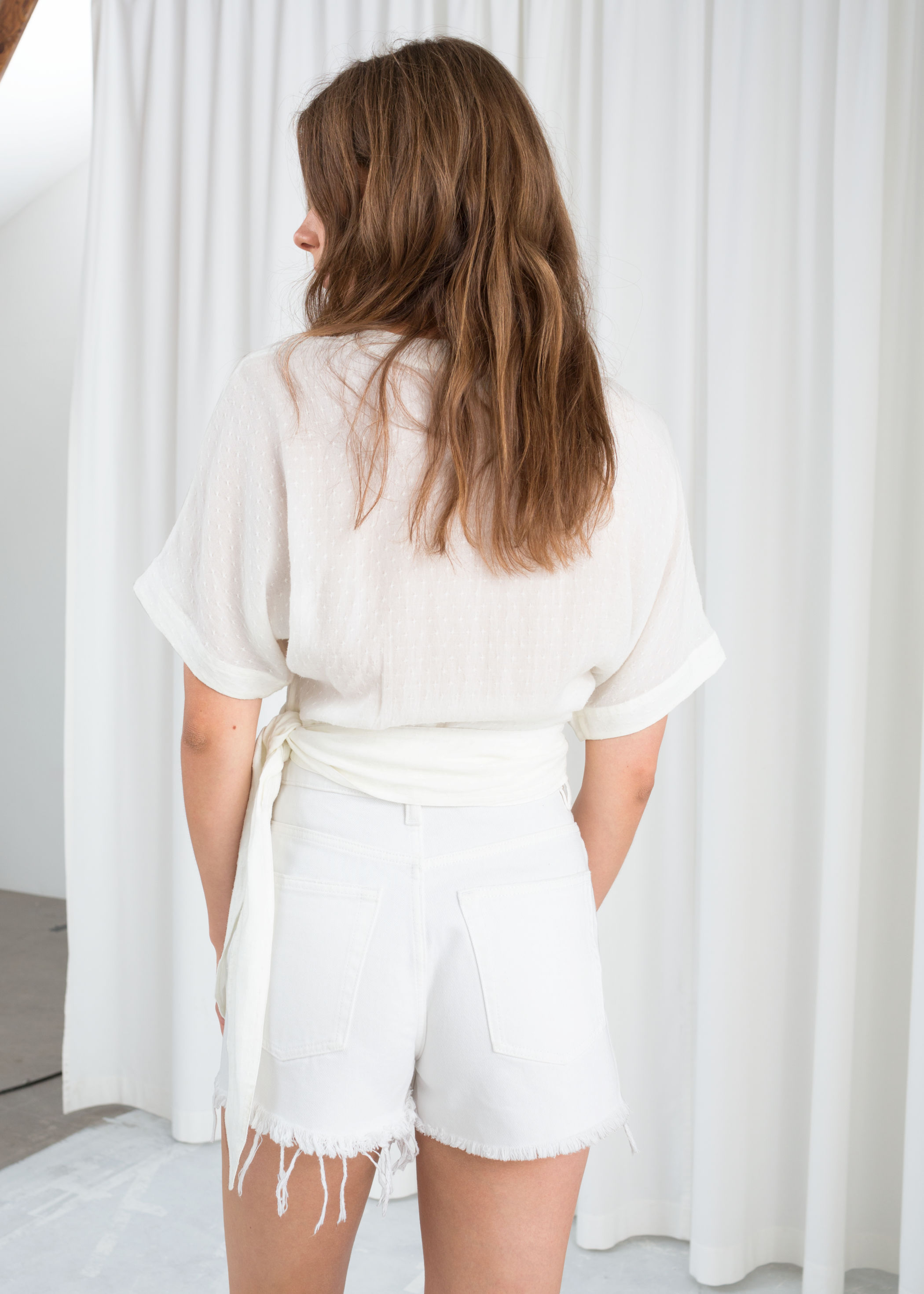 belted wrap blouse